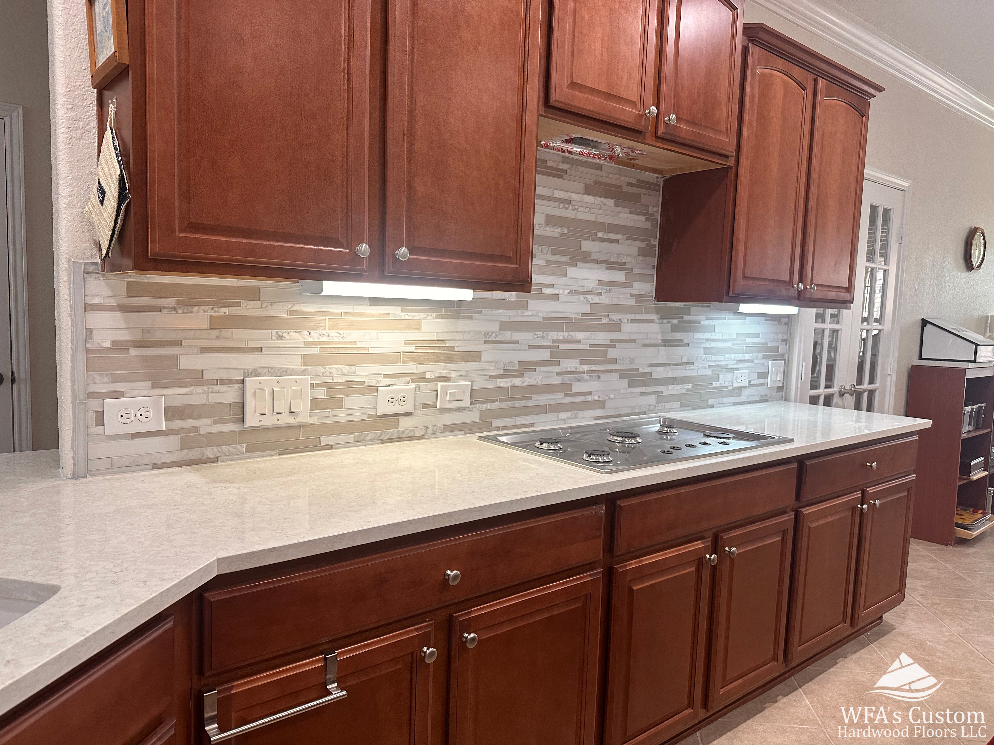 brown / white tile backsplash in kitchen, wfa's custom hardwood floors, houston texas